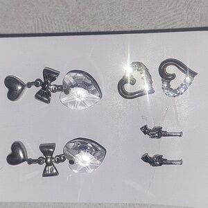 Assorted UM Pierced earrings heart dangle pistols & rhinestone hearts *as is